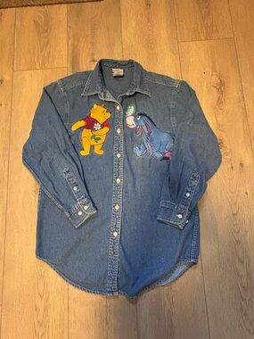 The Disney Store denim shirt top
Winnie the Pooh Size woman's size
small vintage